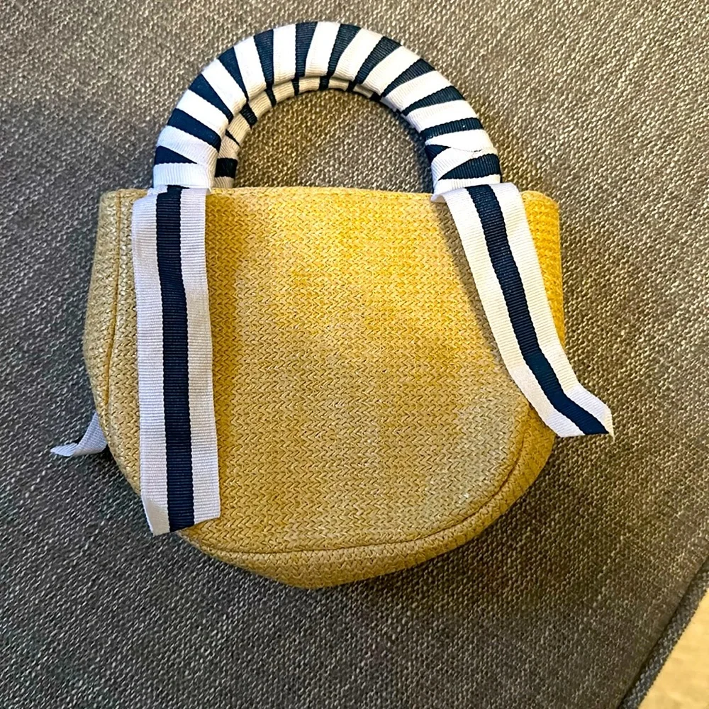 Little girl’s straw purse